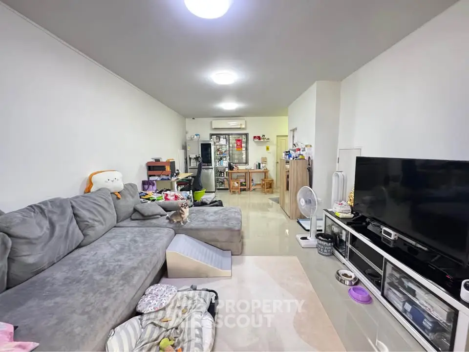 Spacious living room with modern decor and large sectional sofa