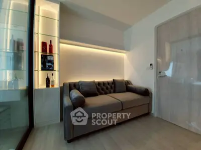 Modern living room with elegant sofa and ambient lighting