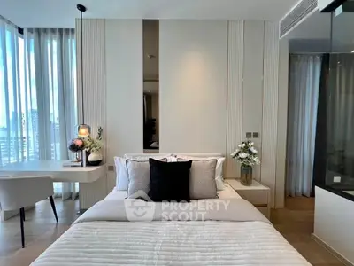 Luxurious modern bedroom with elegant decor and natural light