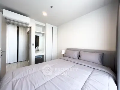 Modern bedroom with sleek design and cozy ambiance