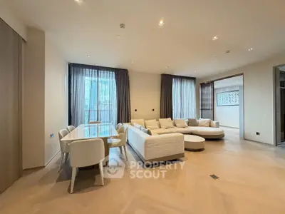 Spacious modern living room with elegant furniture and natural light