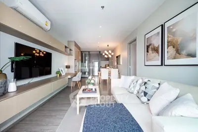 Modern living room with sleek design and cozy ambiance