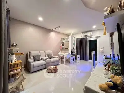 Spacious modern living room with cozy seating and stylish decor