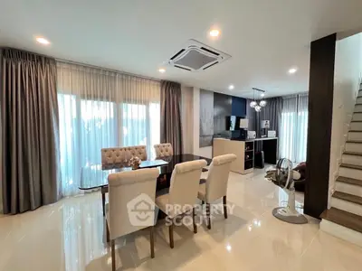 Spacious modern living room with dining area and open kitchen layout