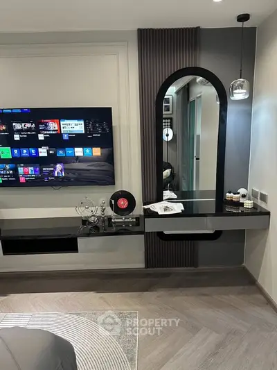 Modern living room with sleek TV setup and stylish decor