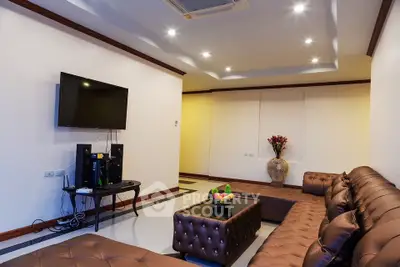 Luxurious living room with modern decor and plush seating