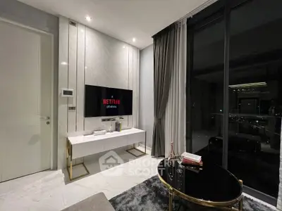 Luxurious modern living room with sleek TV setup and elegant decor, perfect for relaxation and entertainment.
