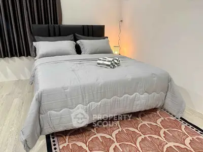 Cozy bedroom with stylish decor and soft lighting