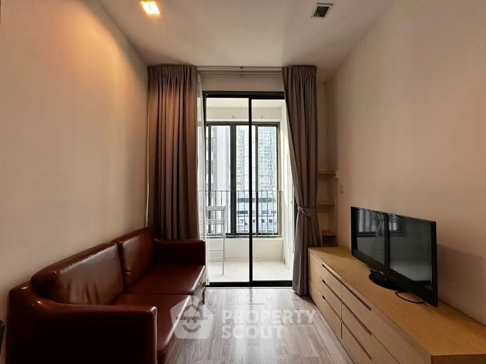 Modern living room with balcony view in urban apartment