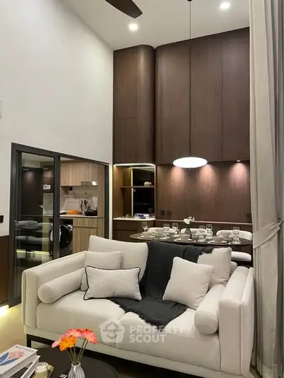 Luxurious modern living room with high ceilings and elegant decor