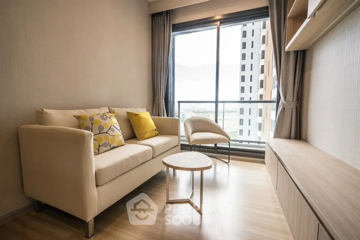 Modern living room with cozy sofa and city view from large window