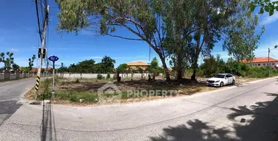 Prime corner lot with potential for development in a serene neighborhood.