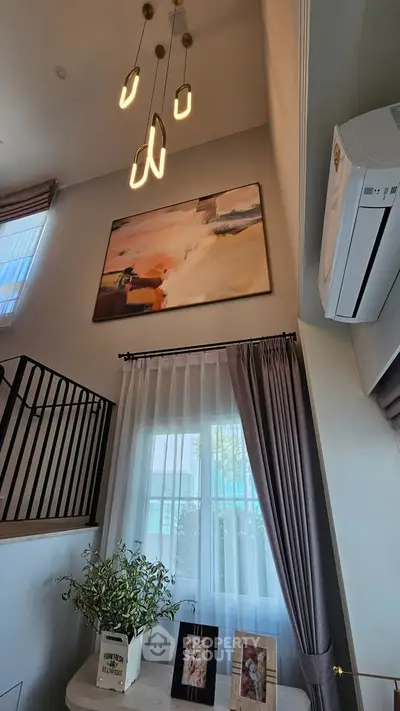 Elegant living room with modern lighting and stylish decor