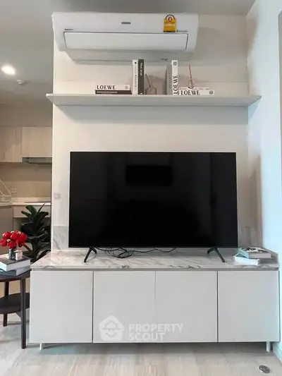 Modern living room with sleek TV setup and stylish decor