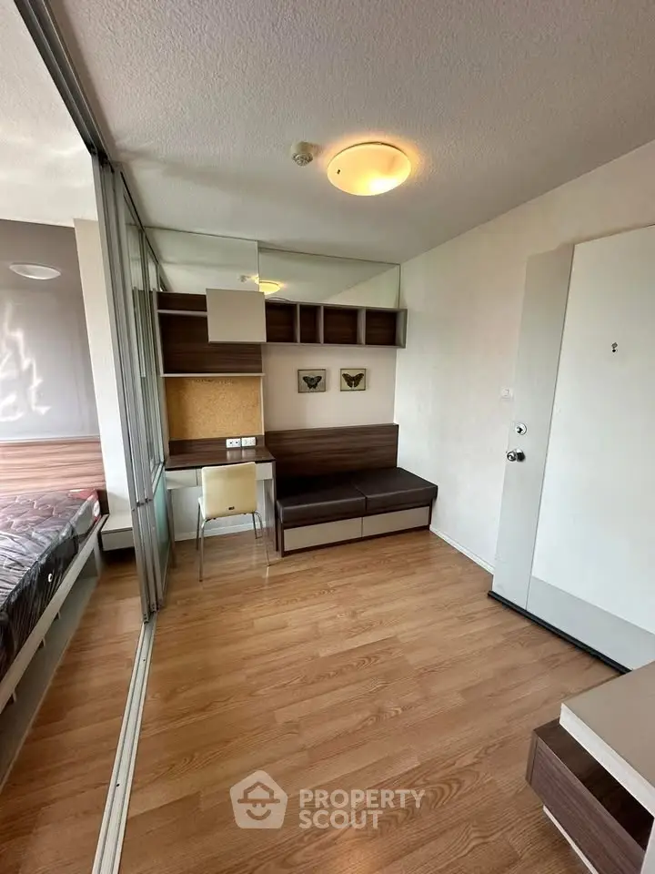 Modern apartment interior with wooden flooring and stylish furniture