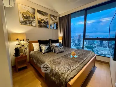 Luxurious bedroom with stunning city view and elegant decor