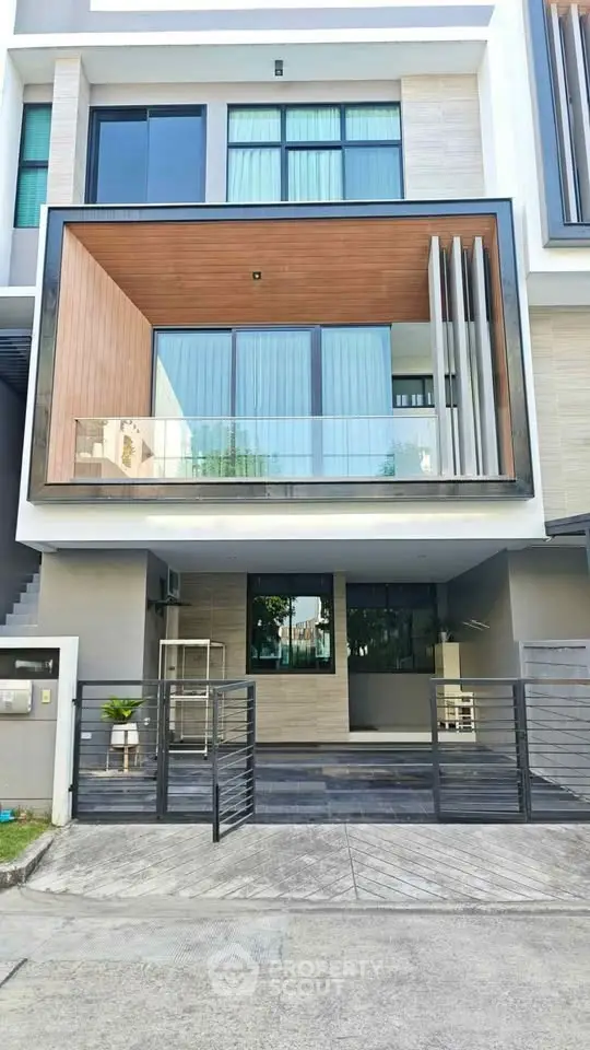 Modern multi-story building with sleek facade and large windows