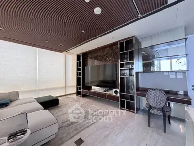 Luxurious modern living room with elegant decor and large TV unit