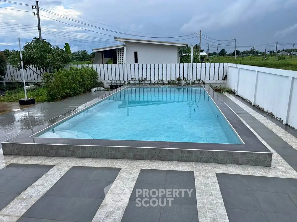 Stunning outdoor pool area with modern design and serene surroundings, perfect for relaxation and leisure.