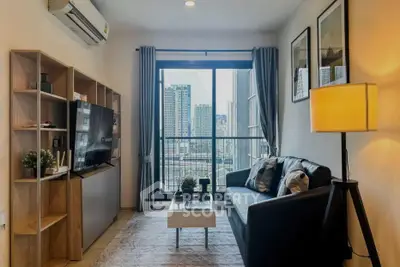 Modern living room with city view, stylish decor, and natural light.