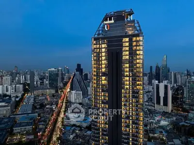 Stunning cityscape view featuring a modern high-rise building at dusk, showcasing urban luxury living.