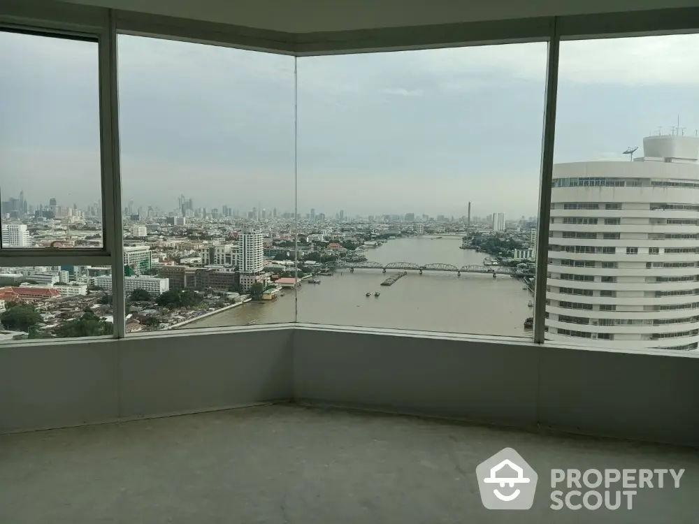 Stunning river and cityscape view from high-rise apartment corner unit.