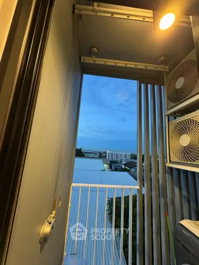 Modern balcony with city view and industrial design elements