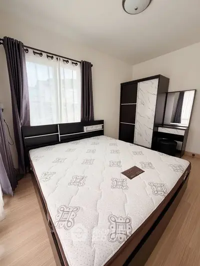 Modern bedroom with stylish furniture and natural light