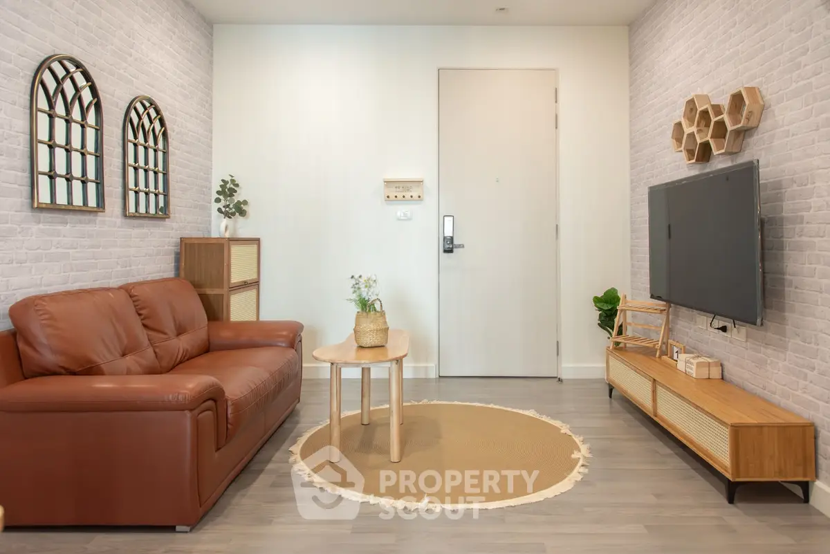 Modern living room with stylish decor and leather sofa