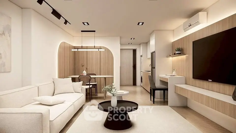 Modern open-plan living room with stylish decor and cozy ambiance.