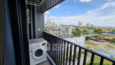 Stunning city view from modern balcony with washing machine