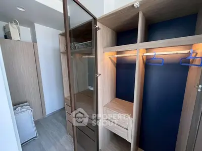 Spacious modern walk-in closet with wooden finish and ample storage space.