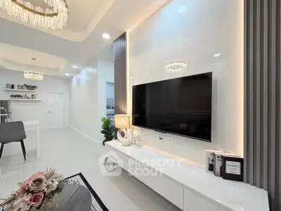 Luxurious modern living room with elegant decor and sleek TV setup