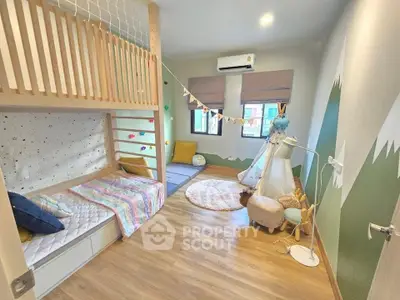 Charming children's bedroom with playful decor and cozy sleeping area.