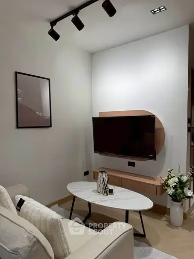 Modern living room with sleek TV setup and stylish decor