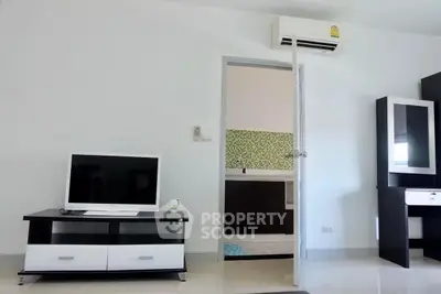 Modern living room with sleek furniture and air conditioning