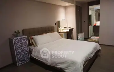Spacious modern bedroom with elegant decor and cozy ambiance