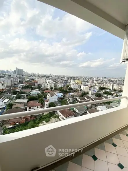 Stunning cityscape view from a high-rise balcony, perfect for urban living enthusiasts.