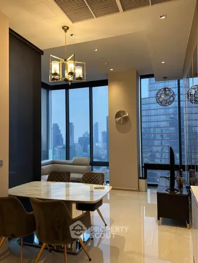 Luxurious modern living room with city view, elegant dining area, and stylish decor in high-rise apartment.