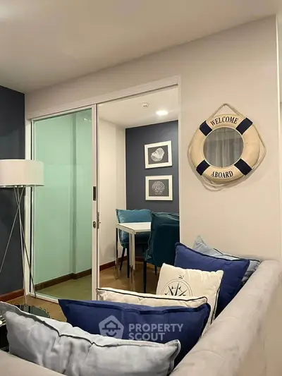 Chic living room with nautical decor and cozy seating area