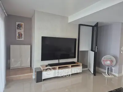 Modern living room with sleek TV setup and stylish decor