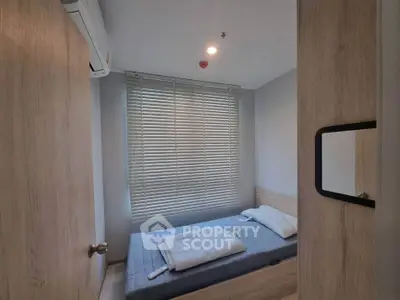 Cozy bedroom with modern decor and natural light