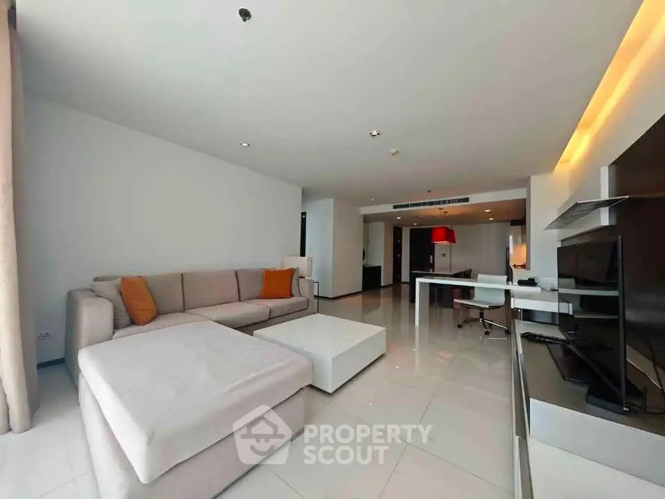 Spacious modern living room with sleek furniture and open layout