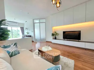 Spacious modern living room with elegant decor and large TV unit
