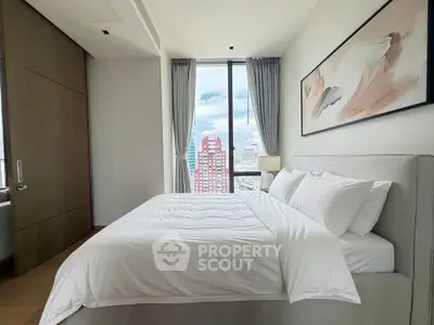 Luxurious bedroom with city view and elegant decor in modern apartment