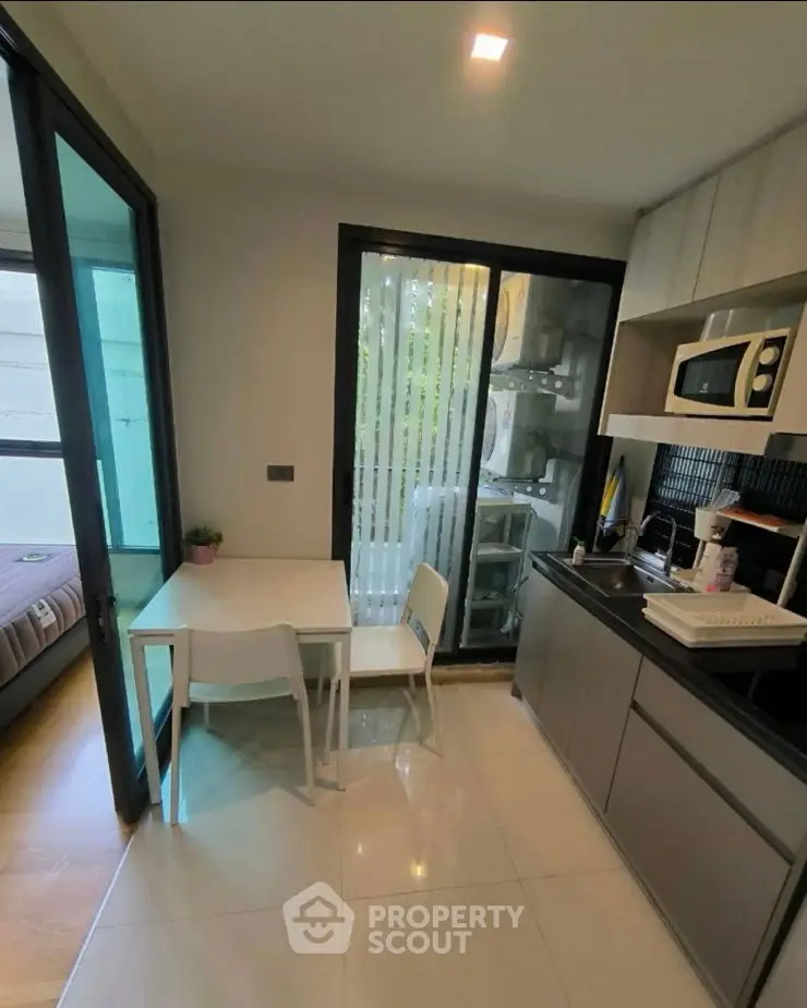 Modern living room with stylish decor and ample natural light