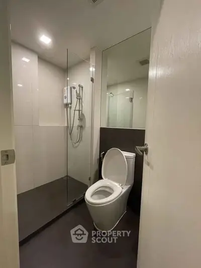 Modern bathroom with glass shower and sleek design