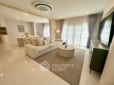 Spacious modern living room with elegant decor and natural light
