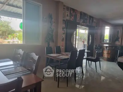 Charming dining area with eclectic decor and natural light