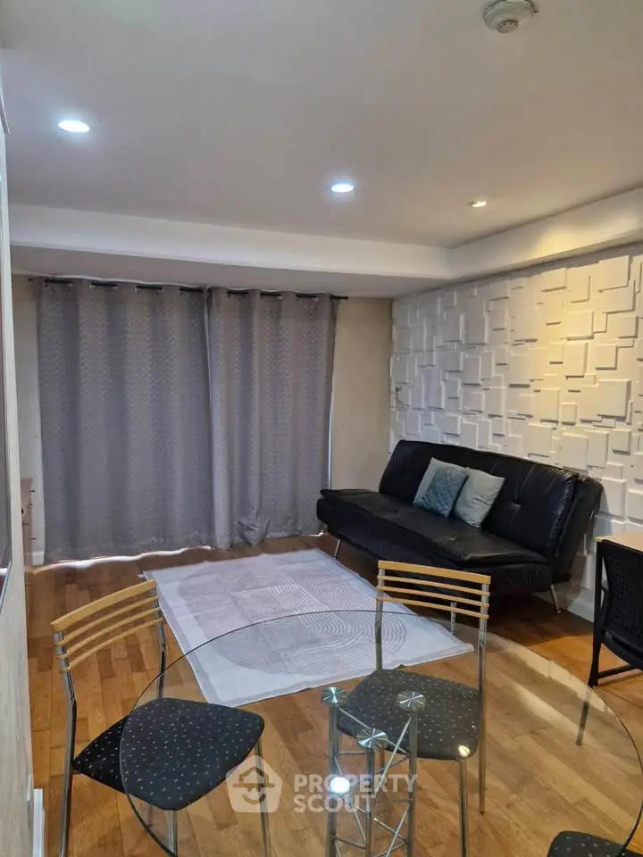 Modern living room with stylish furniture and wooden flooring